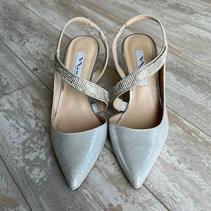 Nina silver sling back 3” pumps with crystal embellishment’s 7M